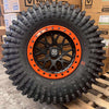 Valor V07 Satin Black w/ Orange Rings Beadlock  + Maxxis Roxxzilla Tires (Mounted Kit) – 15x7 | 4/156 Bolt Pattern | Rock-Ready Combo