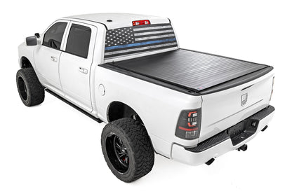 Rough Country | Hard Roll Up Bed Cover | 5'7" Bed | Ram 1500 (09-18)/2500 (09-26)  | 50319550