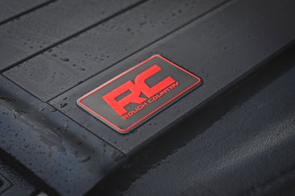 Rough Country | Hard Roll Up Bed Cover | 5'7" Bed | Ram 1500 (09-18)/2500 (09-26)  | 50319550