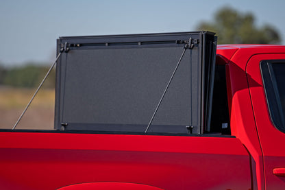 Hard Tri-Fold Flip Up Bed Cover | 5'10" Bed | Chevy/GMC Sierra 1500 (19-25)/Silverado 1500 (19-25)  | 49120580