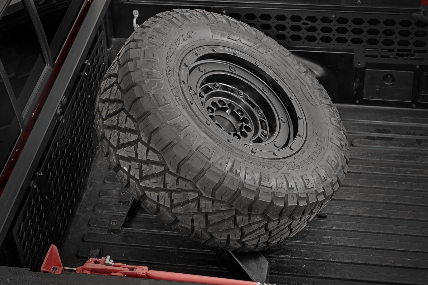 Bed Mount Spare Tire Carrier | Universal (5x5.5 6x5.5 6x135 & 5x5.0 Bolt Patterns) | 73110