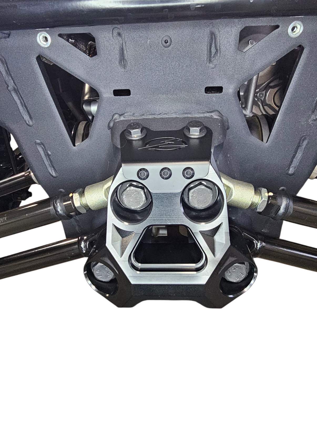 Side view of black anodized Can-Am Maverick R billet radius rod plate installed