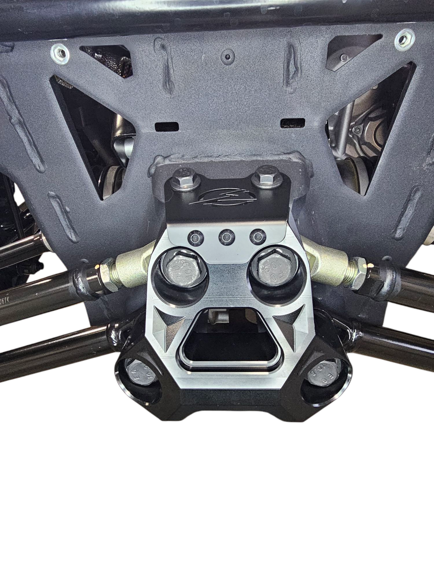 Side view of black anodized Can-Am Maverick R billet radius rod plate installed