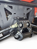 Black billet radius rod plate hardware kit for Can-Am Maverick R before installation