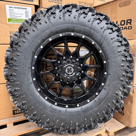 Frontline 762 Gloss Black Tint 4/137-4/156 mounted on Interco Reptile tires Set of 4