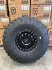 System 3 SB6 Matte Black Beadlock Wheels on Valor Alpha Tires – UTV Wheel & Tire Kit