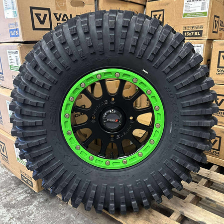 System 3 SB5 Beadlocks 4/156 Matte Black w/ Custom Kawasaki Green rings mounted on Maxxis Roxxzillas