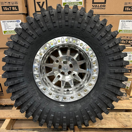 Valor V09 Raw Machined Beadlock 15x10 Mounted on Maxxis Roxxzillas | 4/137 Bolt Pattern