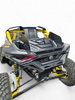 Rear Volt Bumper on 2024 Can-Am Maverick R 2-Door from driver's side rear quarter angle showing angular steel profile and aggressive stance