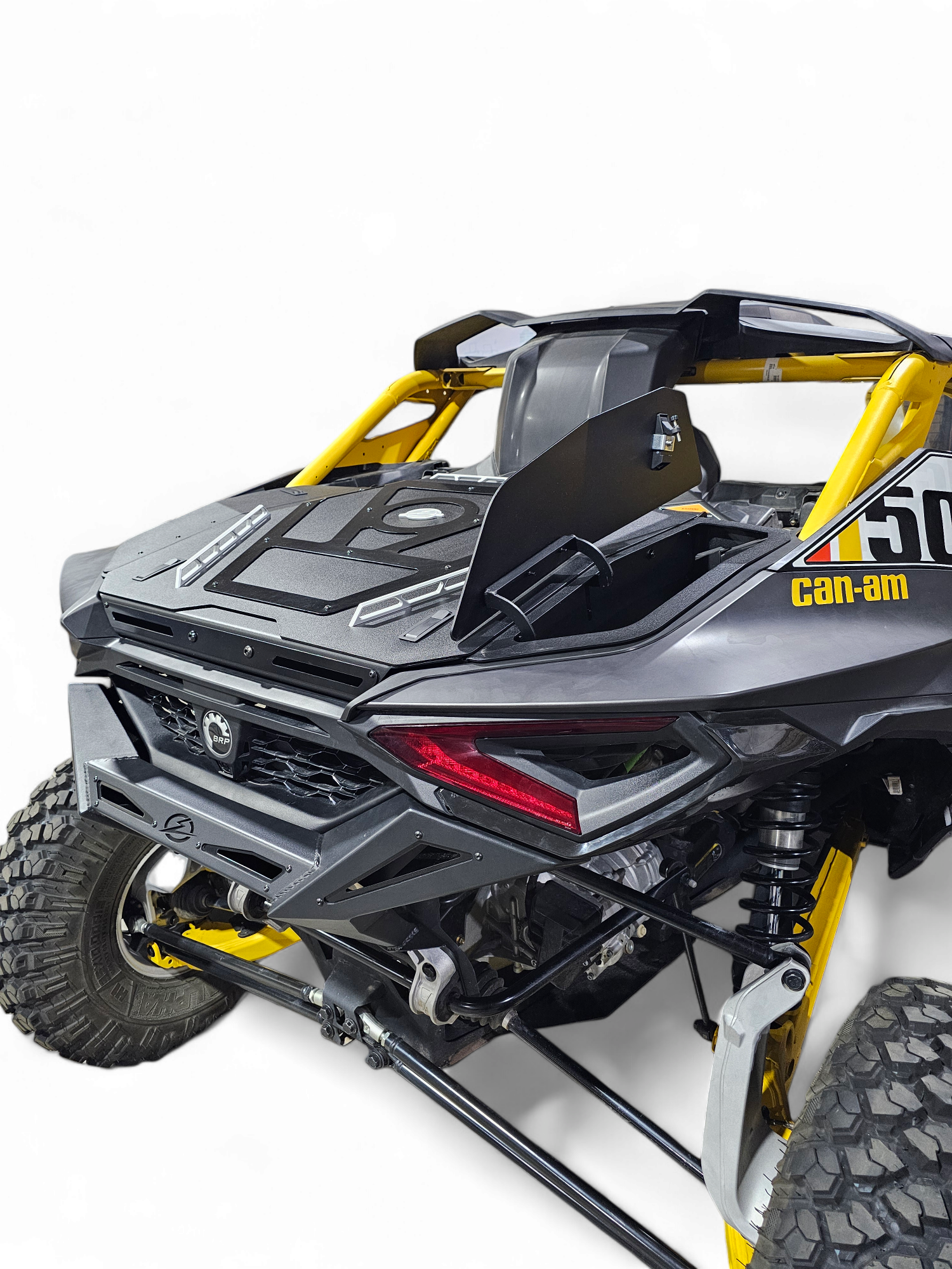 Passenger side rear quarter view of Rear Volt Bumper installed on 2024 Can-Am Maverick R 2-Door showing body line integration