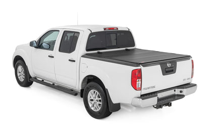 Hard Tri-Fold Flip Up Bed Cover | 5' Bed | Nissan Frontier 2WD/4WD (05-21) | 49520501