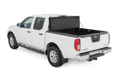 Hard Tri-Fold Flip Up Bed Cover | 5' Bed | Nissan Frontier 2WD/4WD (05-21) | 49520501