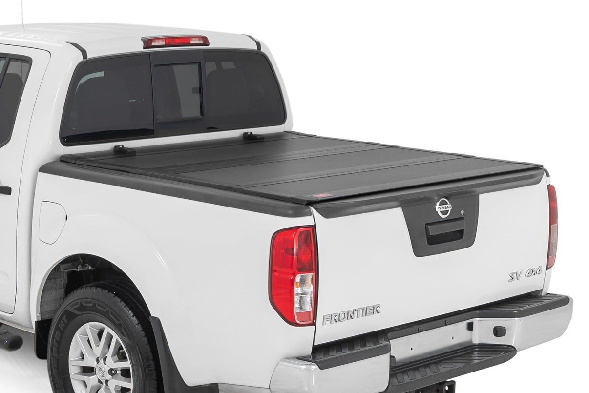 Hard Tri-Fold Flip Up Bed Cover | 5' Bed | Nissan Frontier 2WD/4WD (05-21) | 49520501