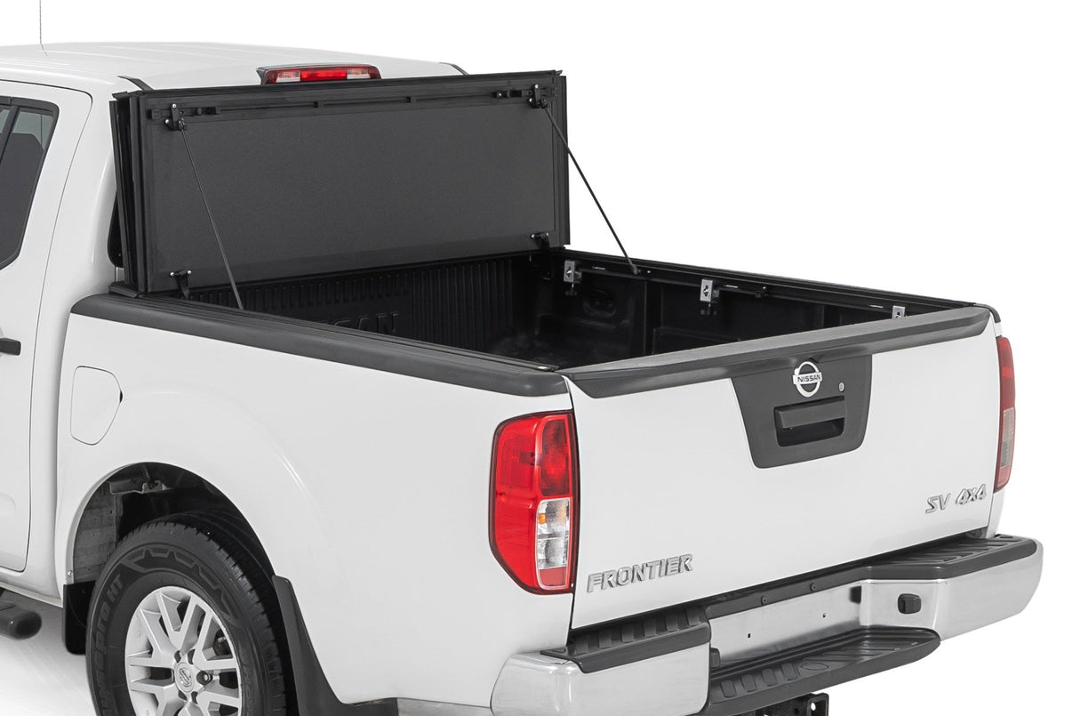 Hard Tri-Fold Flip Up Bed Cover | 5' Bed | Nissan Frontier 2WD/4WD (05-21) | 49520501