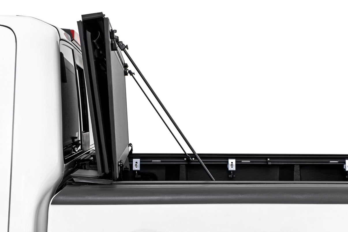 Hard Tri-Fold Flip Up Bed Cover | 5' Bed | Nissan Frontier 2WD/4WD (05-21) | 49520501
