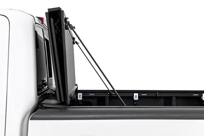 Hard Tri-Fold Flip Up Bed Cover | 5' Bed | Nissan Frontier 2WD/4WD (05-21) | 49520501