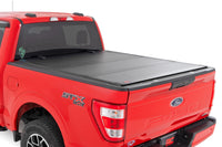 Rough Country | Hard Tri-Fold Flip Up Bed Cover | 6'7" Bed | Ford F-150 2WD/4WD (2015-2020) | 49225650_A