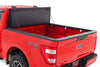 Rough Country | Hard Tri-Fold Flip Up Bed Cover | 6'7" Bed | Ford F-150 2WD/4WD (2015-2020) | 49225650_A