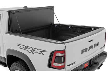 Hard Tri-Fold Flip Up Bed Cover | 6'4" | Ram 1500 (19-25)/1500 TRX (21-24)  | 49320650