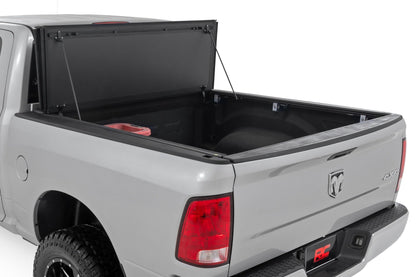Hard Tri-Fold Flip Up Bed Cover | 6'4" Bed | Ram 1500 (10-18)/2500 (10-25)  | 49318650