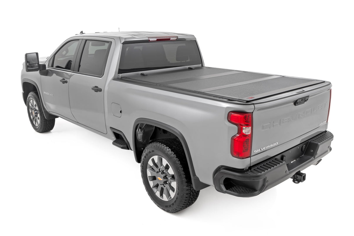 Hard Tri-Fold Flip Up Bed Cover | 6'9" Bed | Chevy/GMC  Silverado/Sierra 2500HD/3500HD (20-25) | 49120651
