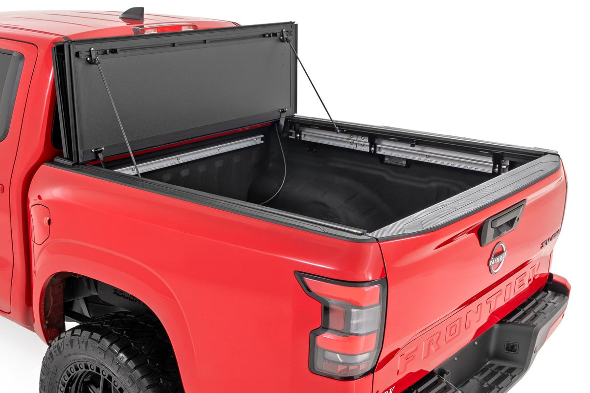 Hard Tri-Fold Flip Up Bed Cover | 5' Bed | Nissan Frontier 2WD/4WD (22-25) | 49520551A