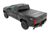 Rough Country | Hard Tri-Fold Flip Up Bed Cover | 6' Bed | Toyota Tacoma 2WD/4WD (2024-2026) | 49420650