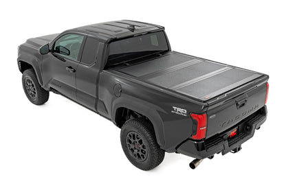 Rough Country | Hard Tri-Fold Flip Up Bed Cover | 6' Bed | Toyota Tacoma 2WD/4WD (2024-2026) | 49420650