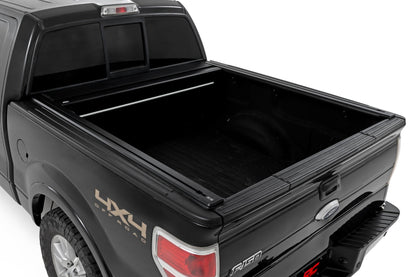 Rough Country | Powered Retractable Bed Cover | 5'7" Bed | Ford F-150 2WD/4WD (2009-2014) | 51221550