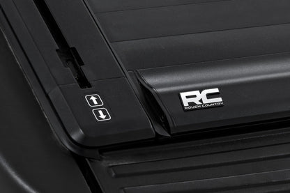 Rough Country | Powered Retractable Bed Cover | 5'7" Bed | Ford F-150 2WD/4WD (2009-2014) | 51221550