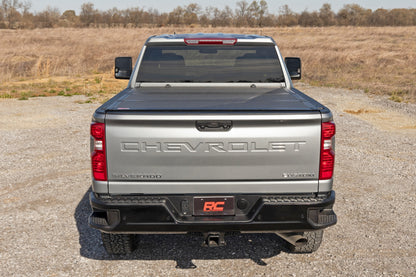 Hard Tri-Fold Flip Up Bed Cover | 6'9" Bed | Chevy/GMC  Silverado/Sierra 2500HD/3500HD (20-25) | 49120651