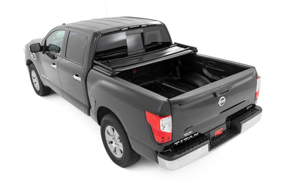 Rough Country | Soft Tri-Fold Bed Cover | 5'7" Bed | Nissan Titan 2WD/4WD (2017-2024) | 41816555A