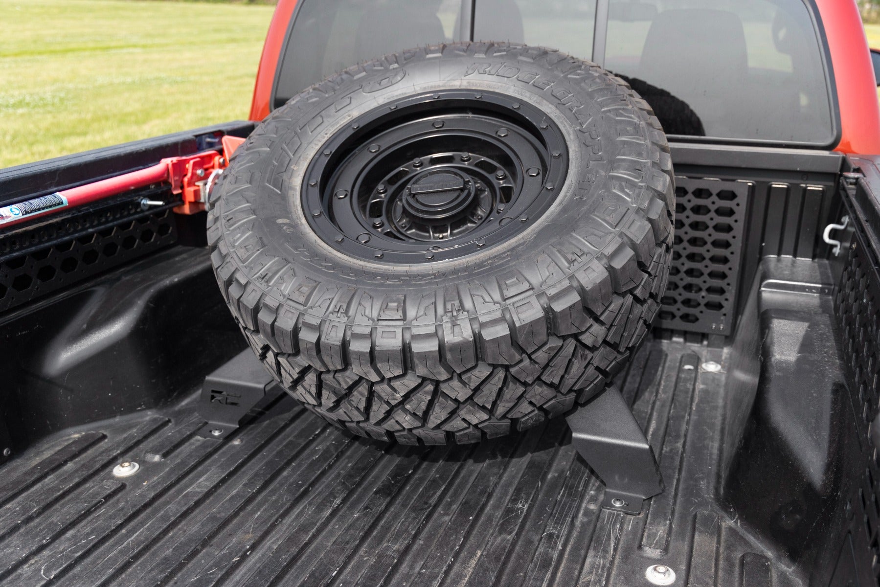 Bed Mount Spare Tire Carrier | Universal (5x5.5 6x5.5 6x135 & 5x5.0 Bolt Patterns) | 73110