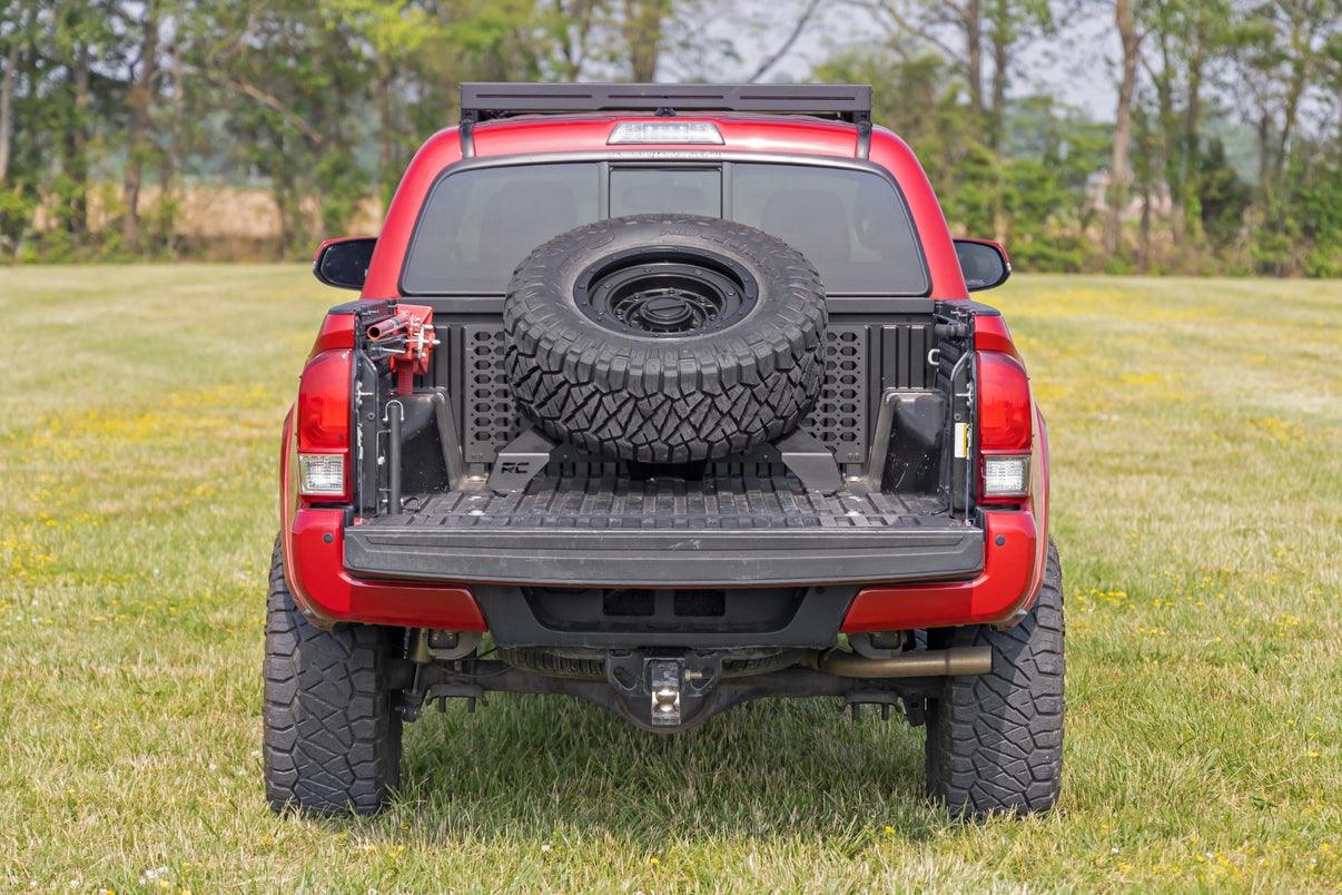 Bed Mount Spare Tire Carrier | Universal (5x5.5 6x5.5 6x135 & 5x5.0 Bolt Patterns) | 73110