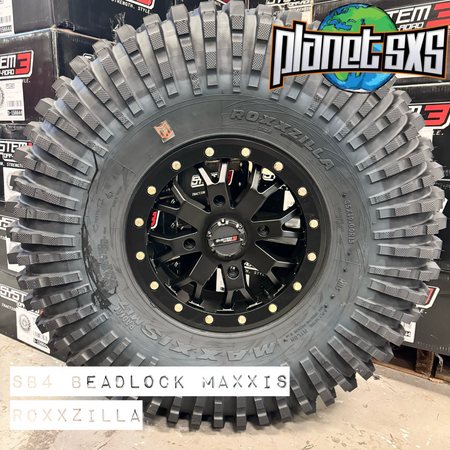 System 3 SB4 Matte Black Beadlocks + Maxxis Roxxzilla Tires (Mounted UTV Kit) | 4/156 PlanetSXS